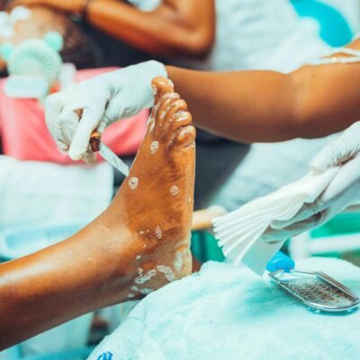 A professional pedicure service in a spa providing relaxation and foot care.